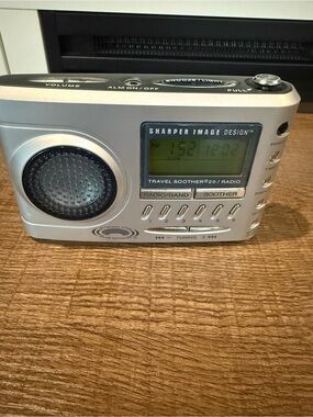 Sharper Image Silver Travel Soother 20 Radio Alarm Clock
